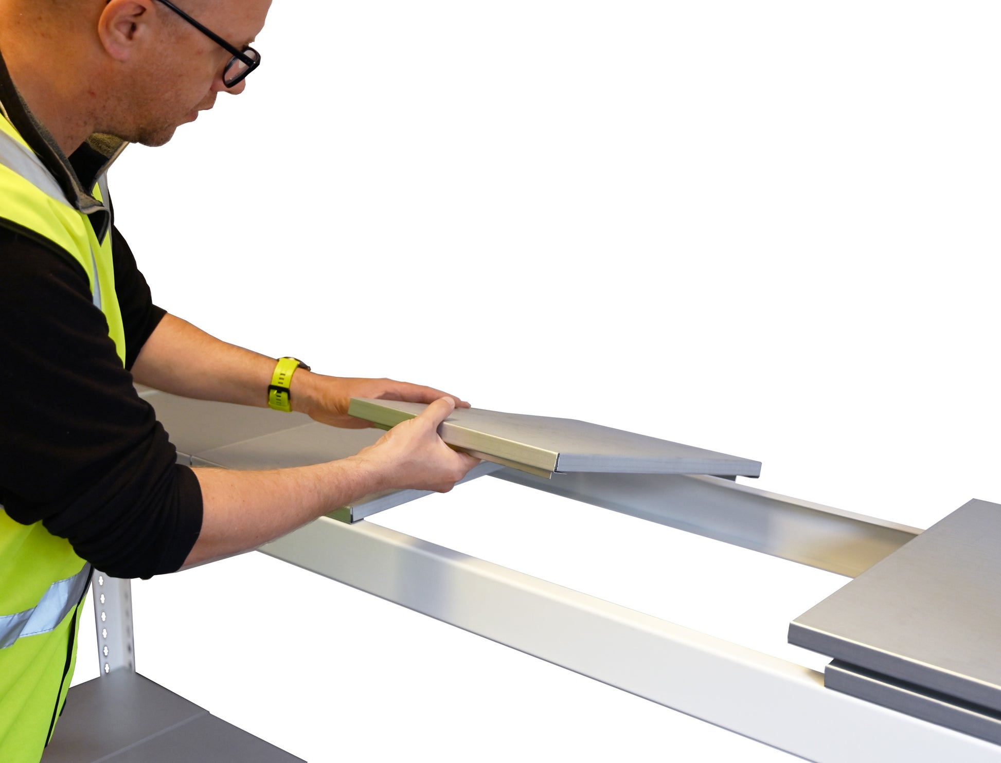 Speedrax Heavy Duty Shelving Being Loaded With Modular Shelving Planks