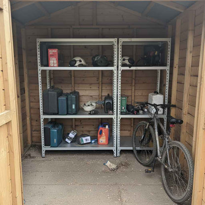 Speedrax medium duty shelving system, with metal shelving decks, installed in a garden shed.