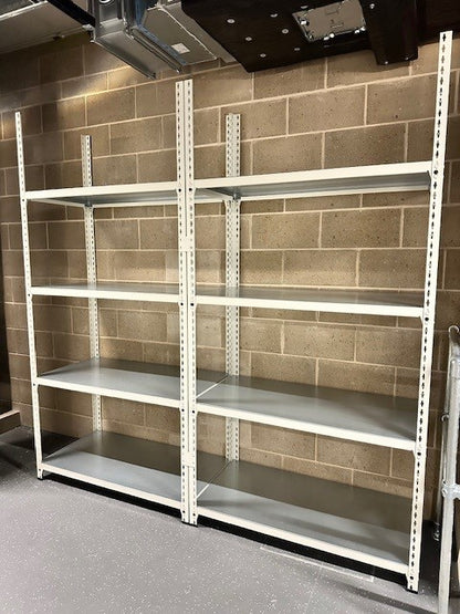 Speedrax medium duty shelving system, with metal shelving decks, installed in an archive.